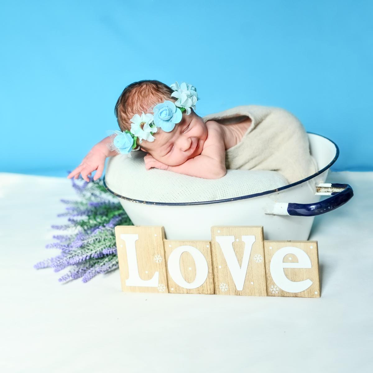 Fotografia noworodkowa- Czesława Włuka- Pani o czerwonych włosach